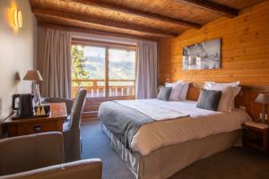 Ένα ή περισσότερα κρεβάτια σε δωμάτιο στο Hotel & Spa Merilys