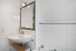 Koupelna v ubytování Geräumige schöne Ferienwohnung + 15 fotografií