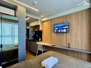 TV a/nebo společenská místnost v ubytování Move - Tambaú