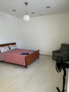 Katil atau katil-katil dalam bilik di Bilocale Cervia Mirabilandia