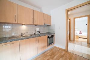 Η κουζίνα ή μικρή κουζίνα στο Boznermüllerhof - Geranie +10 φωτογραφίες