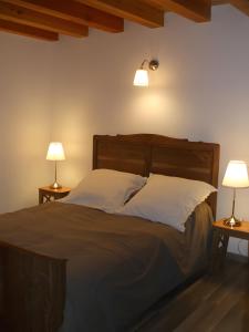 Ένα ή περισσότερα κρεβάτια σε δωμάτιο στο Gite Garaouet