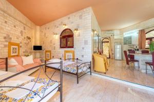 Μια τηλεόραση ή/και κέντρο ψυχαγωγίας στο Paco's Resort Family Villa 11