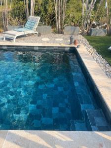 Swimmingpoolen hos eller tæt på Le Second Paradis