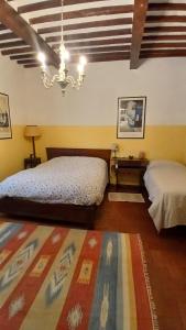 Postel nebo postele na pokoji v ubytování la stanza del sole