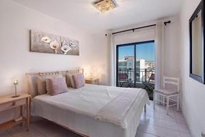 Postel nebo postele na pokoji v ubytování 1 Bedroom Seaview Apartment