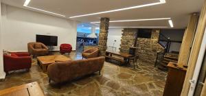 Prostor za sedenje u objektu Villa avec piscine en montagne