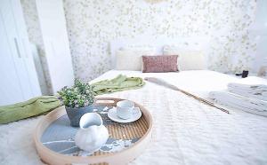 Postel nebo postele na pokoji v ubytování El apartamento de Santa Eva + 23 fotografií