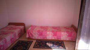 Postel nebo postele na pokoji v ubytování Apartments Martinac