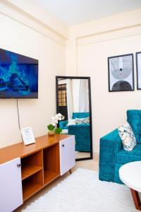 Μια τηλεόραση ή/και κέντρο ψυχαγωγίας στο Sekani Homes