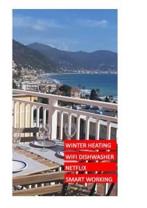a sign for a winter heating with disinterested institution on a building at Spectacular sea view - 3 minutes walk from the sea in Laigueglia