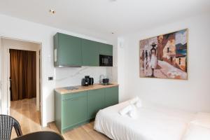 Η κουζίνα ή μικρή κουζίνα στο Les Suites Tour Eiffel