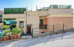 a house on the side of a street at Nice Apartment In Zoagli With Wifi in SantʼAmbrogio