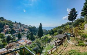 a view of a town from a hill with a playground at Nice Apartment In Zoagli With Wifi in SantʼAmbrogio