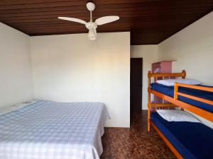 Postel nebo postele na pokoji v ubytování Residencial Raupp