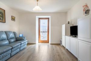 TV a/nebo společenská místnost v ubytování Appartamento Edik