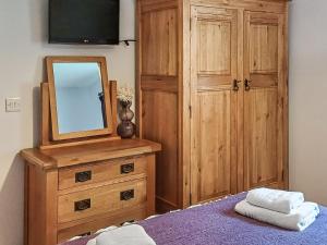 Postel nebo postele na pokoji v ubytování Bwthyn Bwlch + 6 fotografií