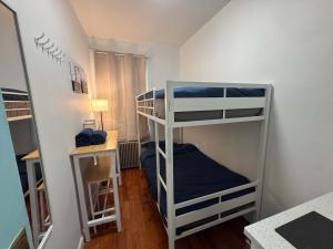 a small room with two bunk beds in it at Room in Chelsea 2 with Kitchen - Shared Bathroom -5th Floor Walk-UP in New York