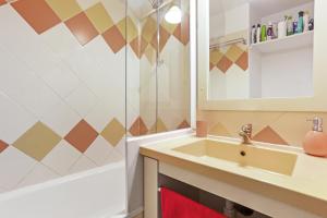 a bathroom with a sink and a shower at Studio Les Parfums de Mimosas in Sainte-Maxime +16 photos