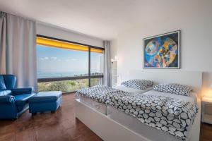 En eller flere senge i et værelse på Villa Bianca + 18 billeder