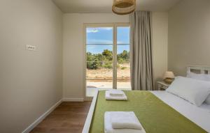 Postel nebo postele na pokoji v ubytování Villa Santa Lucia + 36 fotografií