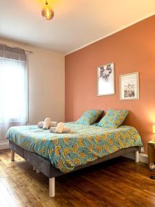 Postel nebo postele na pokoji v ubytování Le Siamois - Appartement de charme bas de Siam