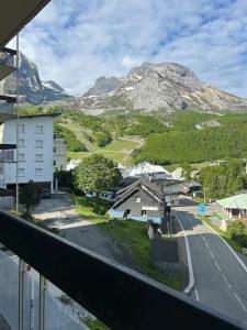 a view of a mountain from a balcony at Station de ski Gourette, Appartement avec chambre in Gourette