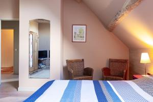 Postel nebo postele na pokoji v ubytování Le Theureau B&B