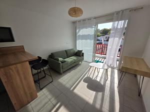 Χώρος καθιστικού στο Appartement Chambre d'Amour