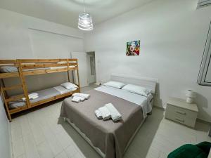 Postel nebo postele na pokoji v ubytování Casa Maria