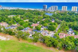 an aerial view of a house with a city at Modern Updated Elite 3BR Beach Home! Close to Golf Course & Beach! in Myrtle Beach
