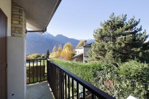 a balcony with a view of a mountain at Relax a Saint-Christophe in Saint-Christophe