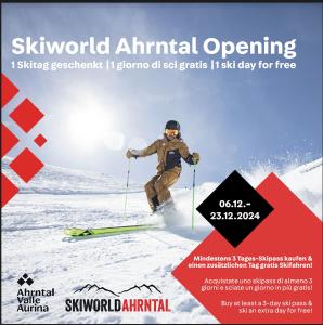 ein Mann fährt auf Skiern einen schneebedeckten Hang hinunter in der Unterkunft App Sonne Nr 15 in Luttach