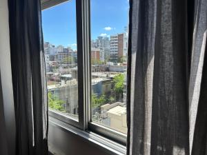 Nespecifikovaný výhled na destinaci Rosario nebo výhled na město při pohledu z apartmánu
