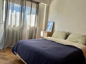 Postel nebo postele na pokoji v ubytování Departamento Moreno