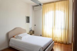 Postel nebo postele na pokoji v ubytování Villa con piscina - Livorno + 37 fotografií