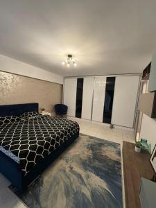 Postel nebo postele na pokoji v ubytování Lucas Apartament 3