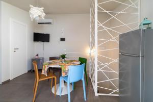 TV a/nebo společenská místnost v ubytování La Dimora della Luna