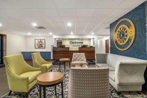 a lobby with chairs and a waiting room at The Clocktower Hotel, an Ascend Collection Hotel in Cohoes +37 photos