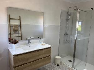 a bathroom with a sink and a shower at Vinyes Can Grau in Sencelles +27 photos