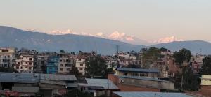 Γενική θέα στο βουνό ή θέα στο βουνό από  αυτό το δωμάτιο σε οικογενειακή κατοικία