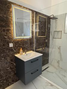 Koupelna v ubytování Apartmani Kula + 12 fotografií