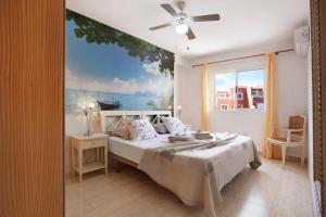 Postel nebo postele na pokoji v ubytování Little Dunes + 17 fotografií