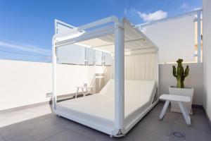 Postel nebo postele na pokoji v ubytování Home Of Tulio + 20 fotografií