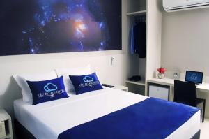 Postel nebo postele na pokoji v ubytování Céu Palmas Hotel