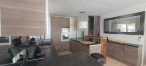 Una cocina o cocineta en L'Echappée Belle de Thau