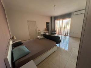 Giường trong phòng chung tại Best In Town