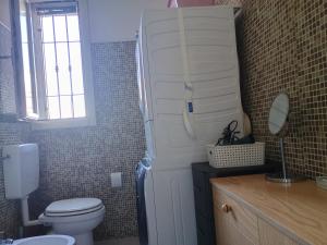 Koupelna v ubytování La Casa dei Pioppi + 22 fotografií