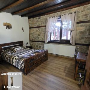 Katil atau katil-katil dalam bilik di Къща за гости МЕЧА СТЪПКА