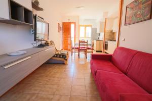 TV a/nebo společenská místnost v ubytování Casa Aisha a Otranto